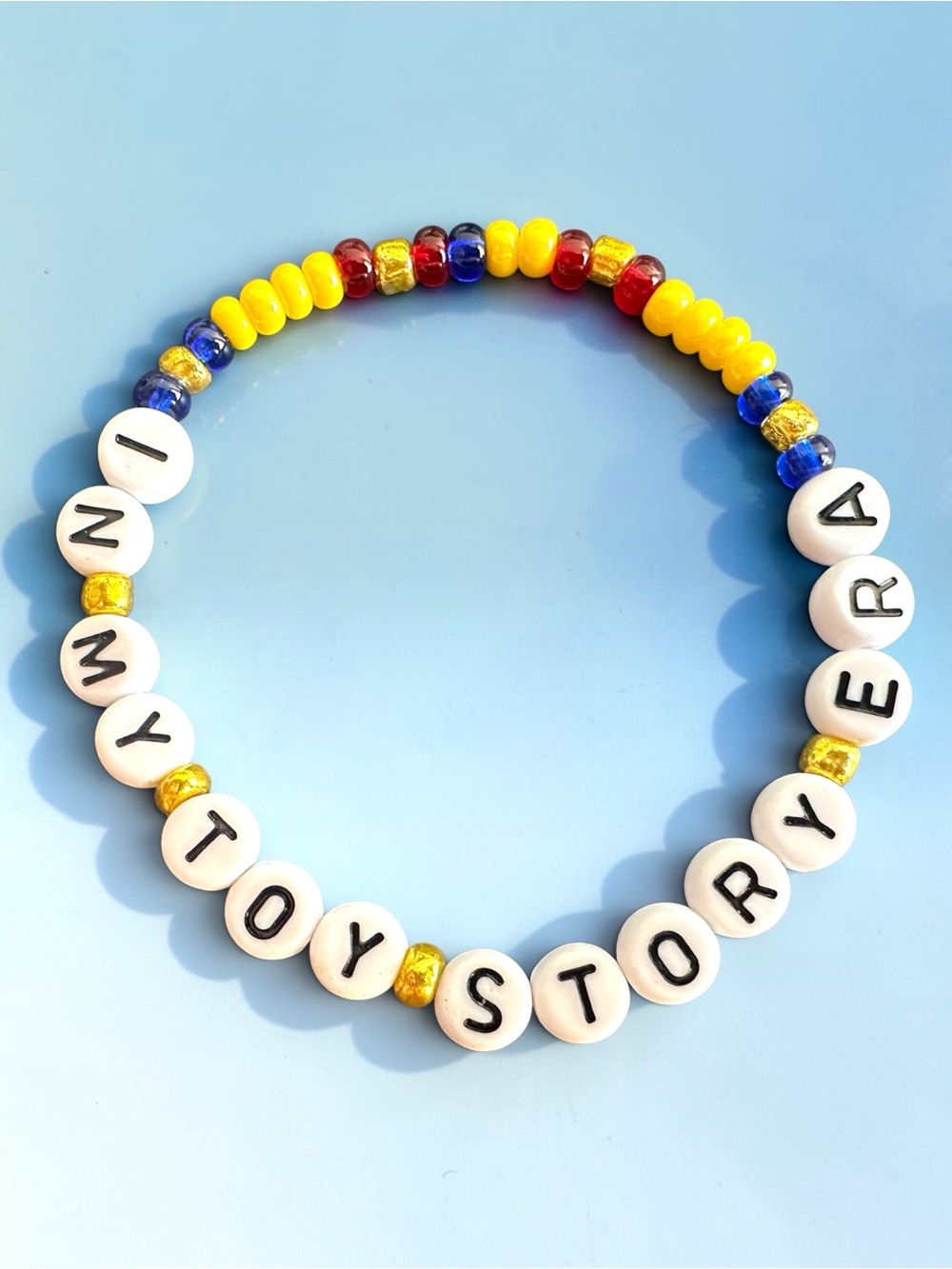 Handmade In My Toy Story Era beaded bracelet